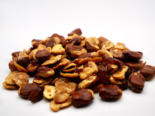 A pile of lablab beans or also known as kacang koro against a white background
