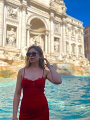 Fototapeta premium young woman in Rome near Trevi Fountain