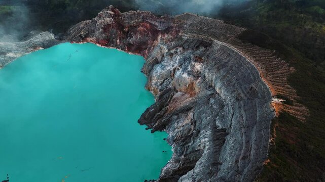 Aerial view of Misty Volcano of Kawah Ijen crater in East Java