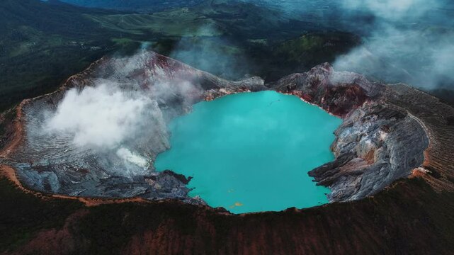 Aerial view of Misty Volcano of Kawah Ijen crater in East Java