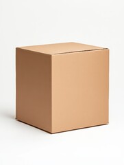 Fototapeta premium Simple brown cardboard box on a white background. Studio shot of plain packaging. Neutral color palette.