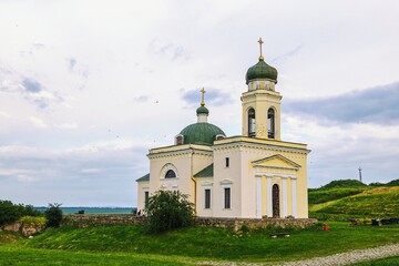 A modern stone church, shot from a wide angle. The photo is suitable for religious themes, architectural projects or travel guides.