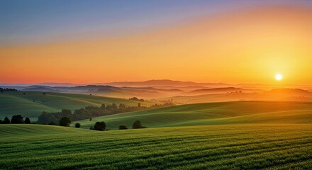 A sunrise over rolling green hills, symbolizing renewal and rebirth
