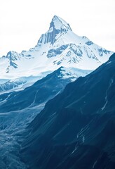 Fototapeta premium Towering snow-capped iceberg dominates frozen mountain range, alpine, arctic