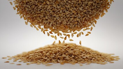 A pile of sesame seeds falls off, creating a messy scene
