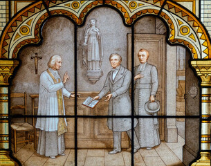 Obraz premium Stained glass (19th century) of St. John Mary Vianney or Saint Jean-Marie Vianney, also known as the Holy Curé d'Ars. Saint of the Catholic Church.