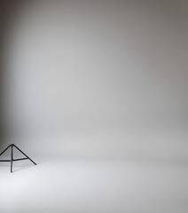 Clean minimalist grey backdrop photoshoot studio, ideal for product photography, packshot photography, high-quality, commercial