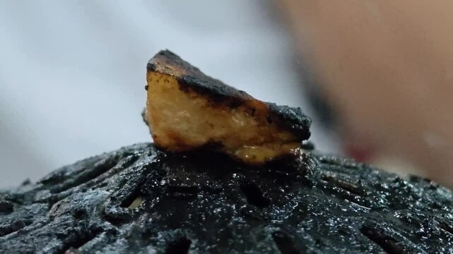 Close up of burned Thai grilled BBQ pan. Carcinogenic and cancer.