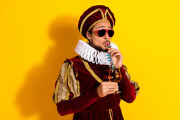 Humorous depiction of a nobleman in a medieval costume with modern sunglasses, sipping a beverage...