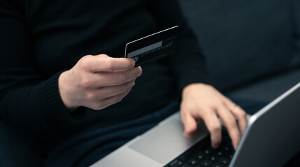 Woman uses digital card for secure online banking.  Modern financial technology, ease and safety of remote transactions. Ideal for illustrating online banking, digital payments, or financial security.
