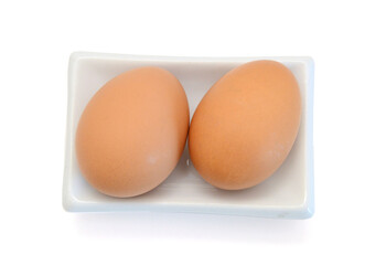 Raw eggs isolated on white background