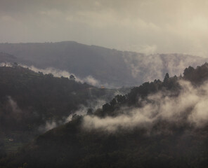 Mountains around the Portotide bridge on the Miño river in Chantada