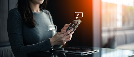 A person interacts with a smartphone displaying AI features, highlighting technology's integration...