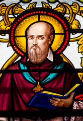 Fototapeta premium Stained glass (1930) of St. Francis de Sales or Saint François de Sales. Doctor of the Catholic Church, founder of the Order of the Visitation.