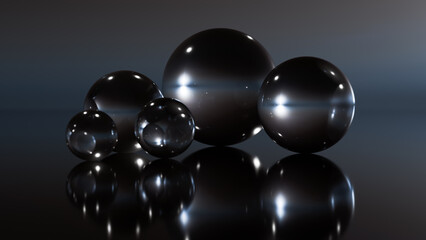 Transparent large balls stand on a glass surface like an abstraction.