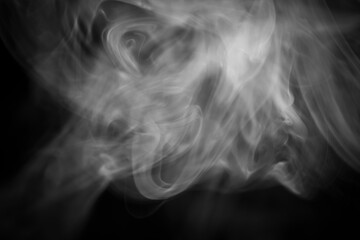 Ethereal Smoke Swirls on Black Background in Dreamlike Display