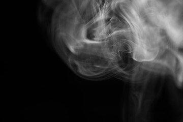 Abstract Swirling Smoke Patterns in Monochrome Background