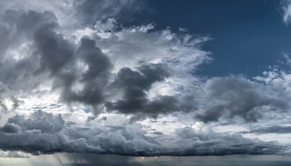 Fototapeta premium beautiful grey clouds background majestic grey clouds panorama over horizon