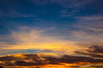 hazy sky view at sunset. orange clouds