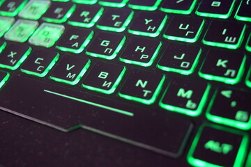 Computer keyboard with green keys