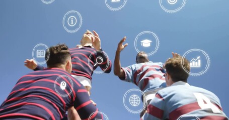 Reaching for rugby ball, players with animation icons overlaying clear blue sky - Powered by Adobe