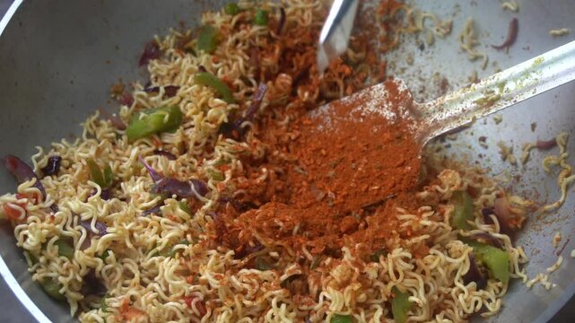 Boil water, add Maggi noodles and seasoning, cook for 2 minutes, stir well, and enjoy a quick, tasty meal.