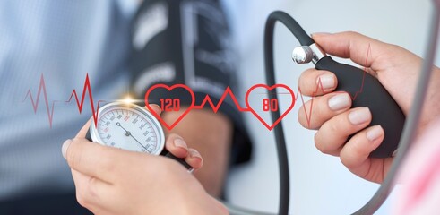 Blood Pressure Check: A doctor uses a stethoscope and blood pressure monitor on patient.