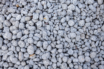 Rock wall. Background of stone for decoration. texture for design. Granite pebbles texture