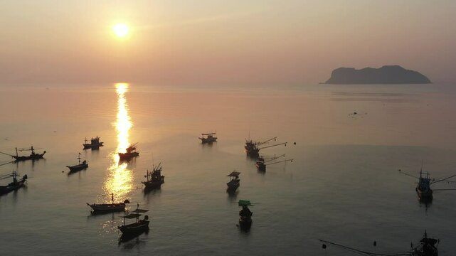 Sunrise view in the morning at Ban Hin Kop fishing village, near the pier to Koh Tao, Chumphon Province : Thailand.

