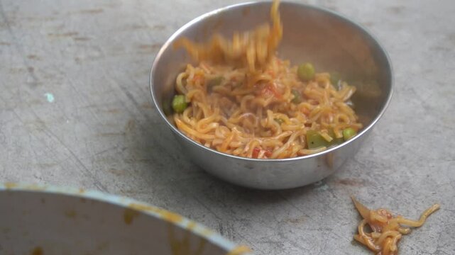 Boil water, add Maggi noodles and seasoning, cook for 2 minutes, stir well, and enjoy a quick, tasty meal.