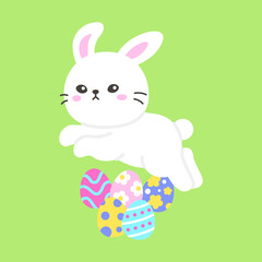 Obraz premium Adorable White Bunny Hopping Over Vibrant Easter Eggs on Green Background