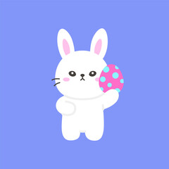 White Bunny Holding Large Pink Easter Egg with Blue Polka Dots