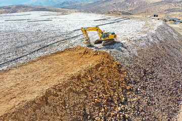PROFILING PLATFORMS AND SLOPES WITH HEAVY MACHINERY ON LEACHING PADS AT MINE CLOSURES
