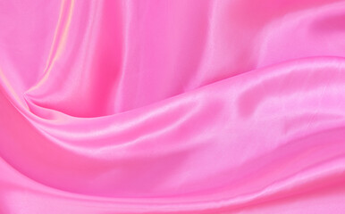 White pink satin texture that is gray silver fabric silk background with beautiful soft blur...