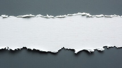 Textured White Surface Revealed Through Torn Gray Layer, Abstract Background with Space for Text and Graphic Elements.