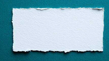 White torn paper on textured blue background provides a clean and artistic backdrop for your creative projects.