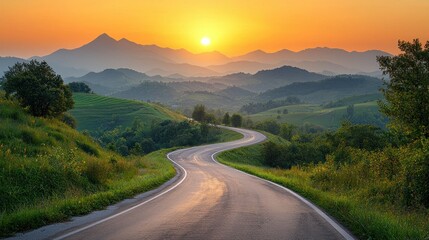 Majestic Sunset Over Winding Road and Mountain Range
