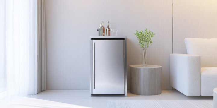 Compact mini fridge in the interior of a modern living room. Mini bar in the hotel room.