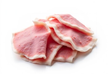 A pile of sliced ham on a white surface