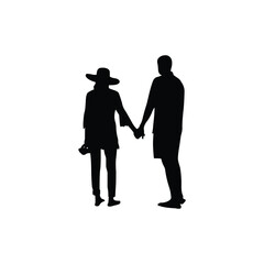 Silhouette of Two People Holding Hands in Friendship