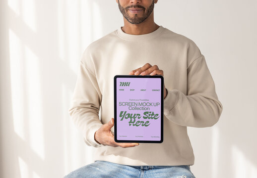 Tablet Screen Mockup Being Held by man. PSD vertical screen mockup