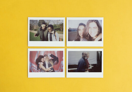  Mockup of Four blank polaroids are arranged in a neat grid on Bright Yellow