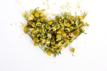 Dry chamomile flower petals isolated on white background. Chamomile tea is a herbal infusion made from dried chamomile flowers and hot water, and may improve sleep quality.