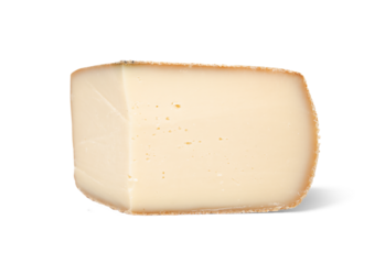 Isolated raclette cheese wheel cross section. Fresh raclette cheese made from cows milk. Swiss traditional meal in winter times or in France. Melting Cheese Dinner. Selective focus. White background.