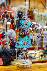 Native American Hopi Kachina Doll. Hopi Kachina Hoop Dancer doll in store display. Authentic Hopi Kachina Hoop Dancer collectible. Traditional ceremonial figure represents Native American spirituality