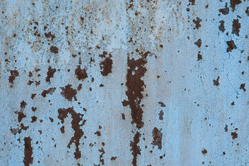 Rusty metal surface with blue paint. Abstract background and texture for design.