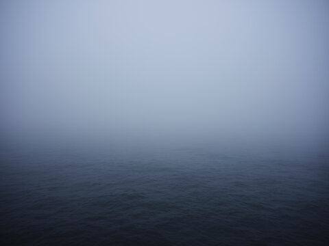 misty morning in the sea - Powered by Adobe