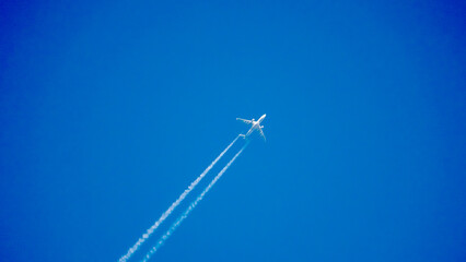Passenger plane in blue sky