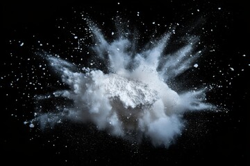 Powder explosion against a black background