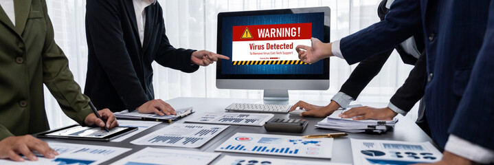Virus warning alert on computer screen detected brisk cyber threat , hacker, computer virus and...